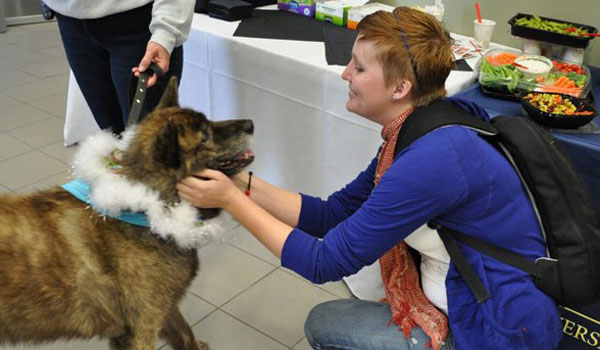 Student with visiting dog