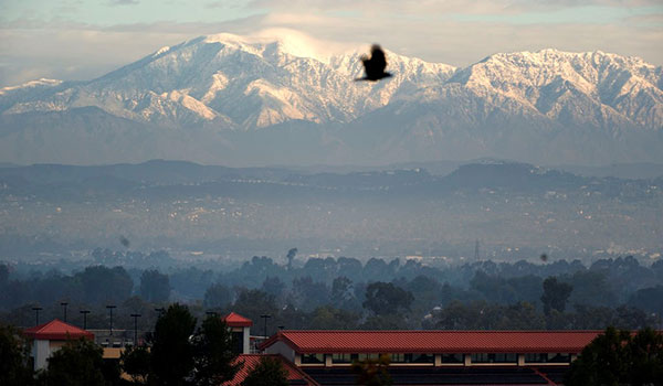 Aerial view of campus and mountains 