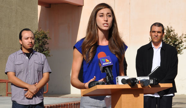 Clinic student speaking at press conference