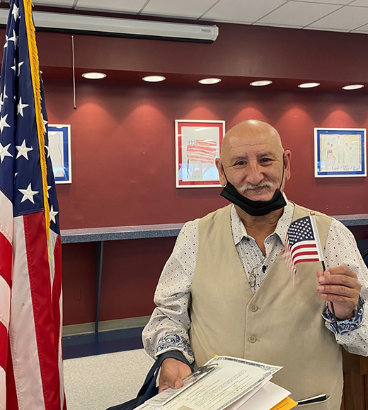 Pictured: IRC client, U.S. Army veteran Victor Partida, at his naturalization ceremony