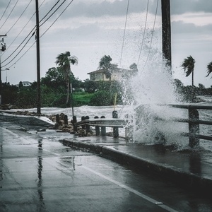 Wave crashing over roadway