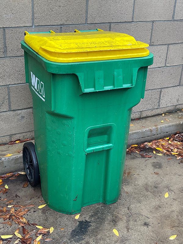 compost bin, green with a yellow top