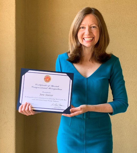 Prof. Jane Stoever holding award