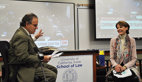 Prof. Weinstein and Joan Biskupic in discussion